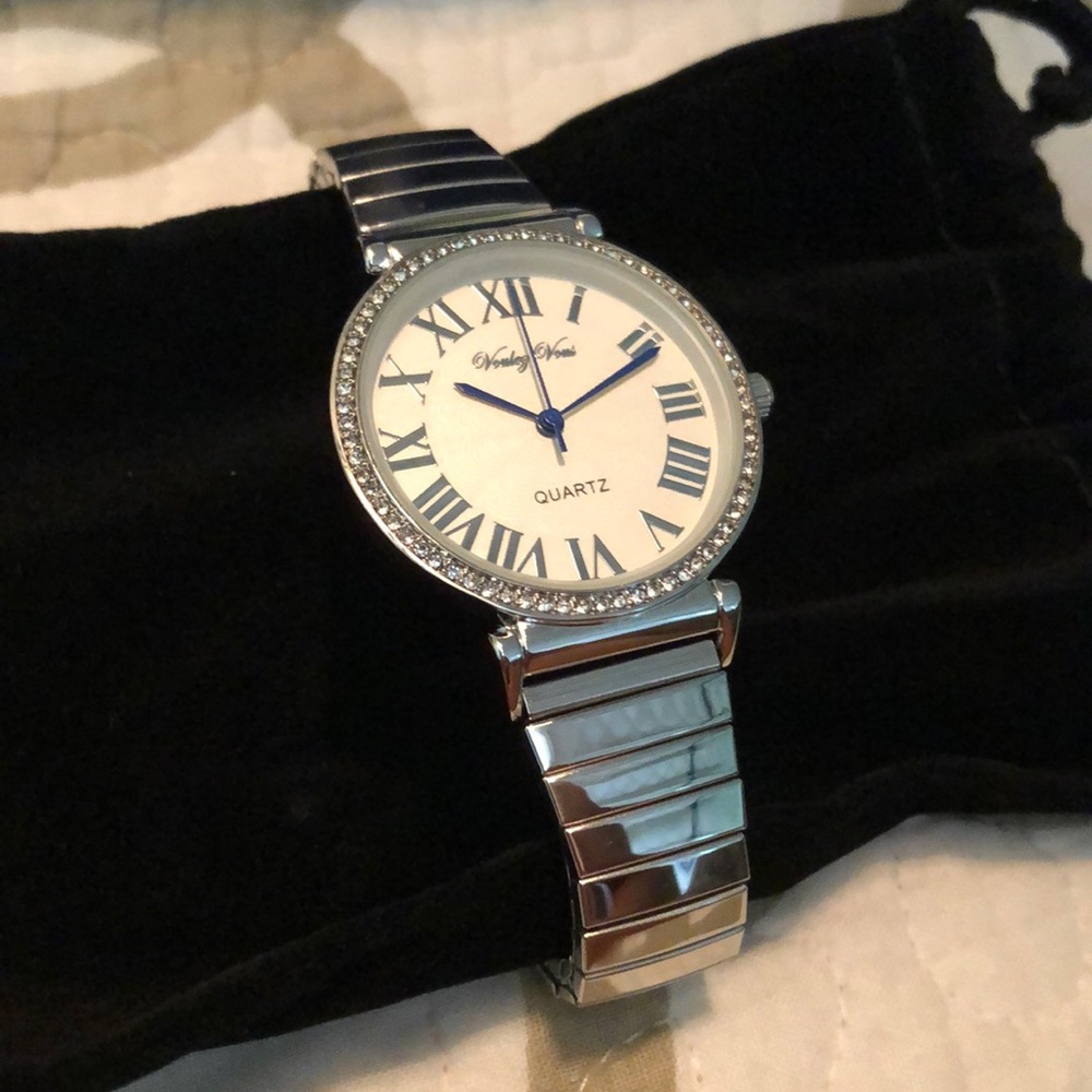 New watch never used silver stretch band